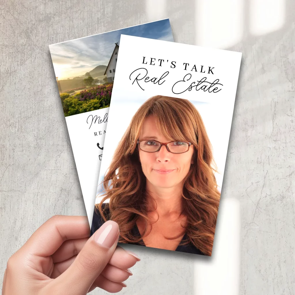 Real estate business card with photo of sold house and close-up portrait of agent