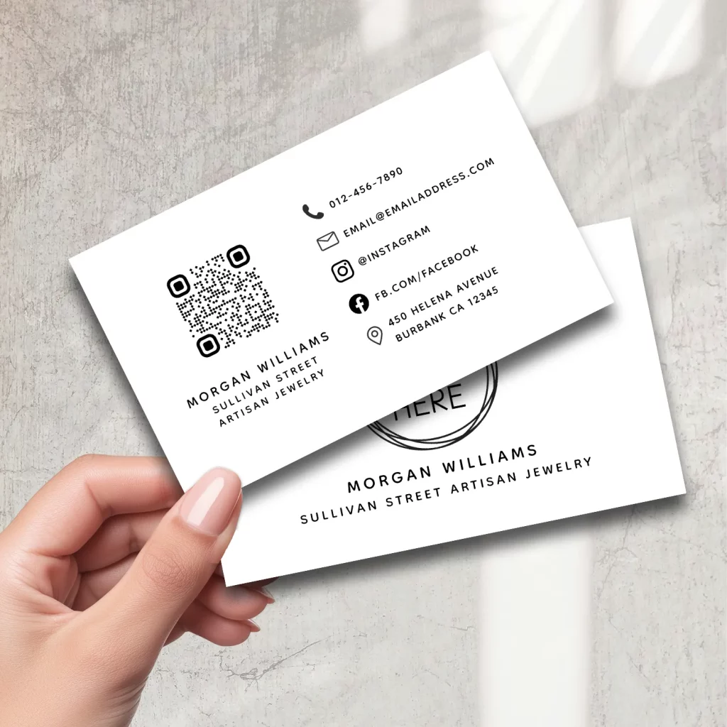 Black and white artisan jewelry business card with QR code and social icons